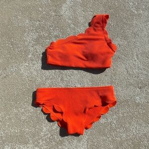 Orange scalloped one shoulder bikini